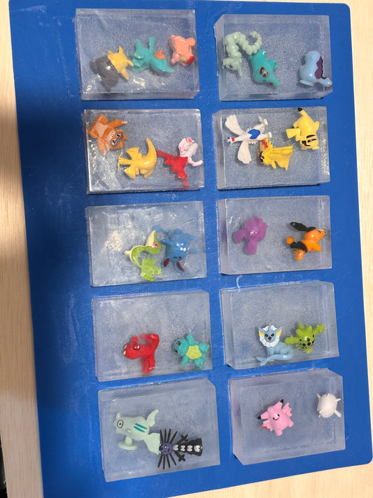 Figure Soap W/ choice of a Pokemon Booster Pack